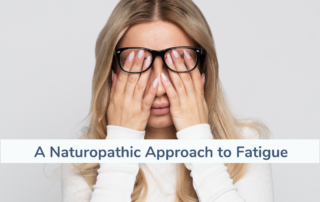 Woman rubbing her eyes and looking fatigued with a title which reads "A naturopathic approach to fatigue".